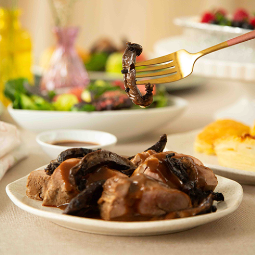 Pescaditos de cerdo con champiñones portobello y salsa al oporto